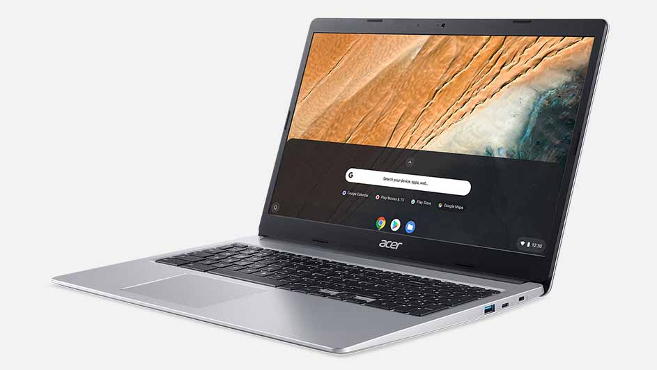 Een zilverkleurige Acer-laptop staat open met een zwart toetsenbord en een scherm met een zoekbalk en app-iconen.