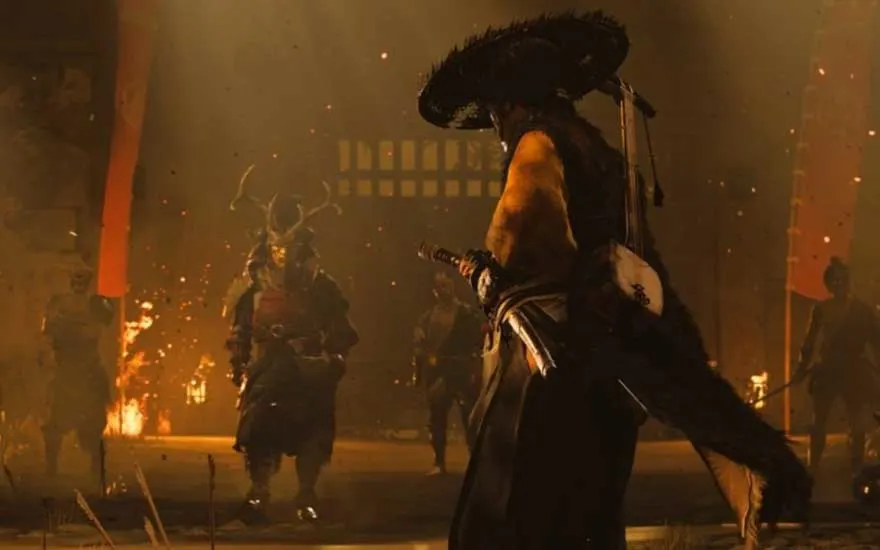 Atmospheric scene from a samurai video game, showing one warrior wearing a hat facing armed opponents by firelight.