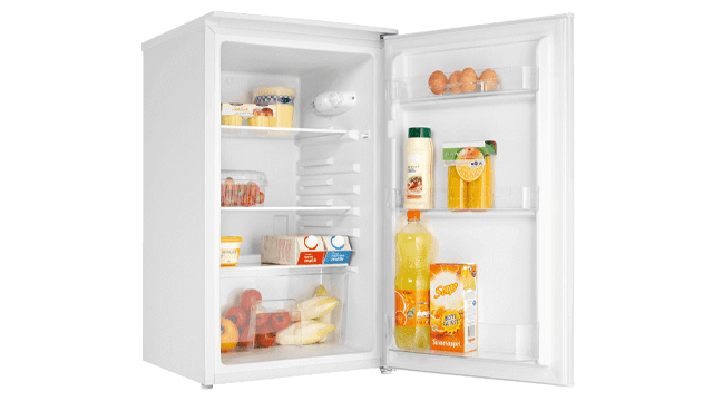 Open white refrigerator filled with food items like eggs, juice, and fruit on shelves.