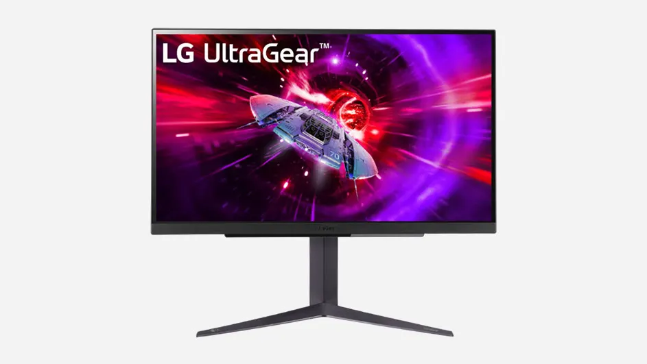 Een computerscherm toont een ruimteschip tegen een paars-rode achtergrond, met een zwarte voet op een witte achtergrond.