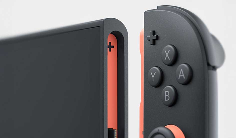 Een close-up van een zwarte Nintendo Switch met een afgekoppelde rode Joy-Con controller, waarbij de knoppen duidelijk zichtbaar zijn.