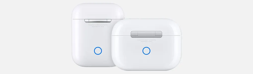 Two white wireless earbud charging cases are displayed, each with a blue indicator light and a metallic hinge.