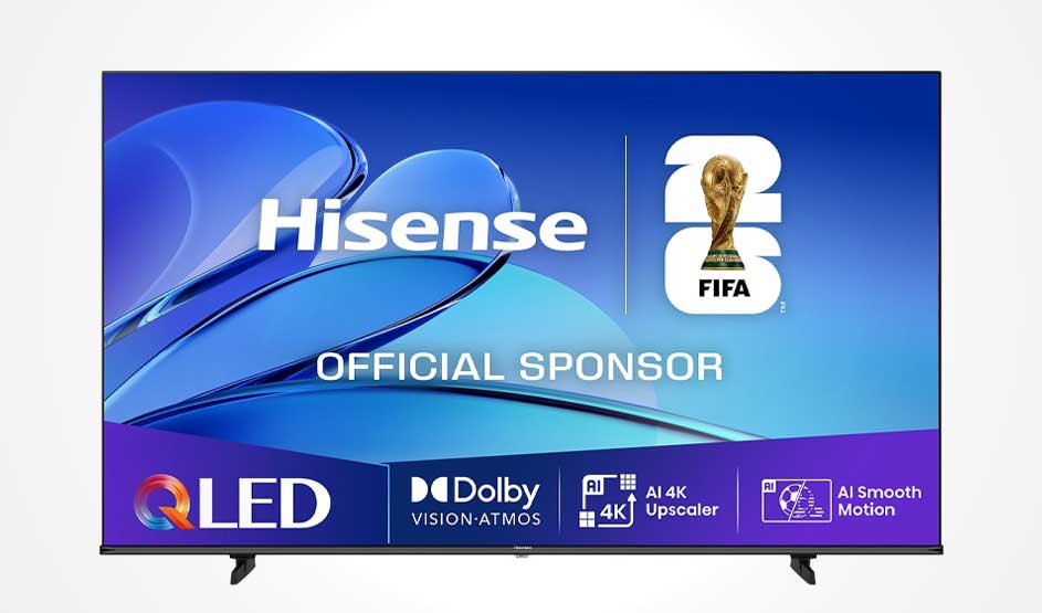 A Hisense television displays FIFA 2026 official sponsor logo. Blue gradient background with wavy design elements. QLED, Dolby Vision Atmos, 4K upscaler, AI Smooth Motion technologies shown at the bottom.