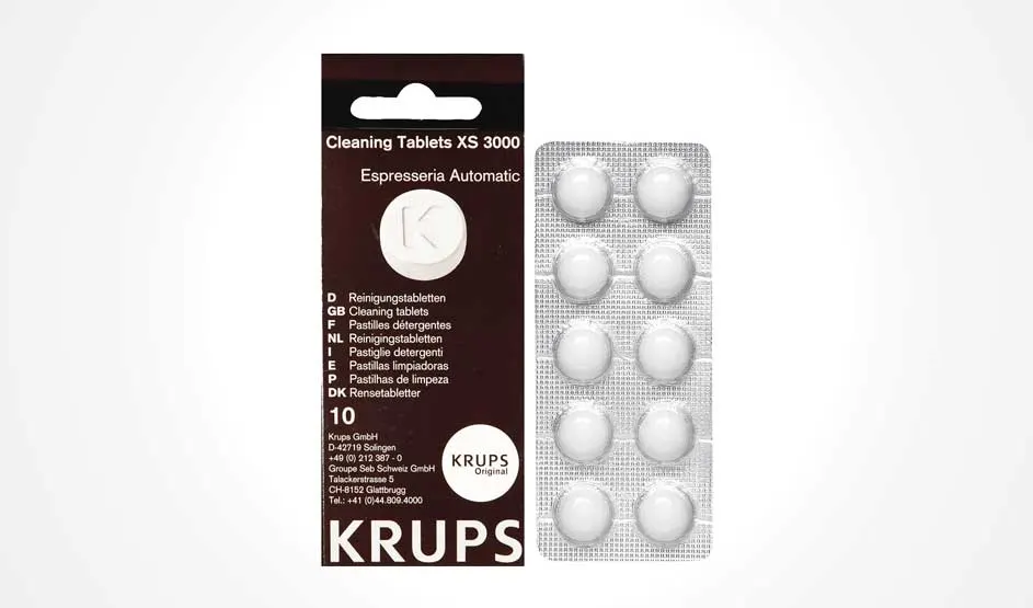 Op de afbeelding zie je een verpakking van KRUPS reinigingstabletten XS 3000 voor volautomatische espressomachines, met 10 tabletten.
