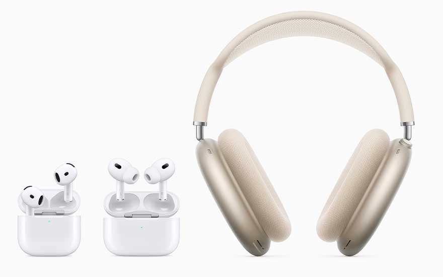 On a pale backdrop, two charging cases with white AirPods are lined up on the left, while a cream over-ear headphone set stands to the right.