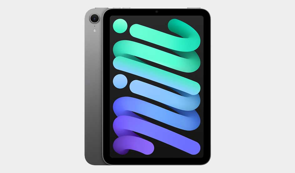 Op de afbeelding zie je een grijze Apple iPad mini met een kleurrijk scherm waarop het woord "mini" in blauwe en groene tinten staat.