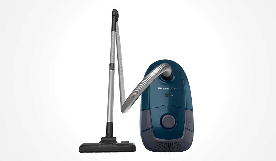 A dark blue Rowenta cylinder vacuum stands upright, silver hose and wand leading to a wide black floorhead on a white background.