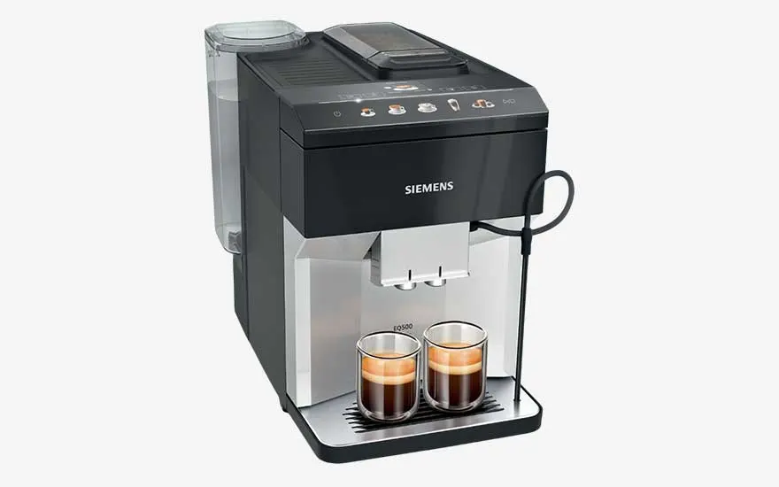 Black Siemens coffee machine with two glass espresso cups underneath and a transparent water tank on the side.