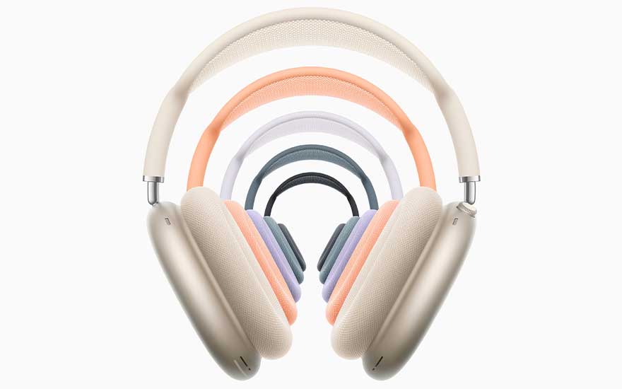 Several AirPods Max headphones in soft pastel colours form nested arches, creating a colourful tunnel-like effect on a bright white background.