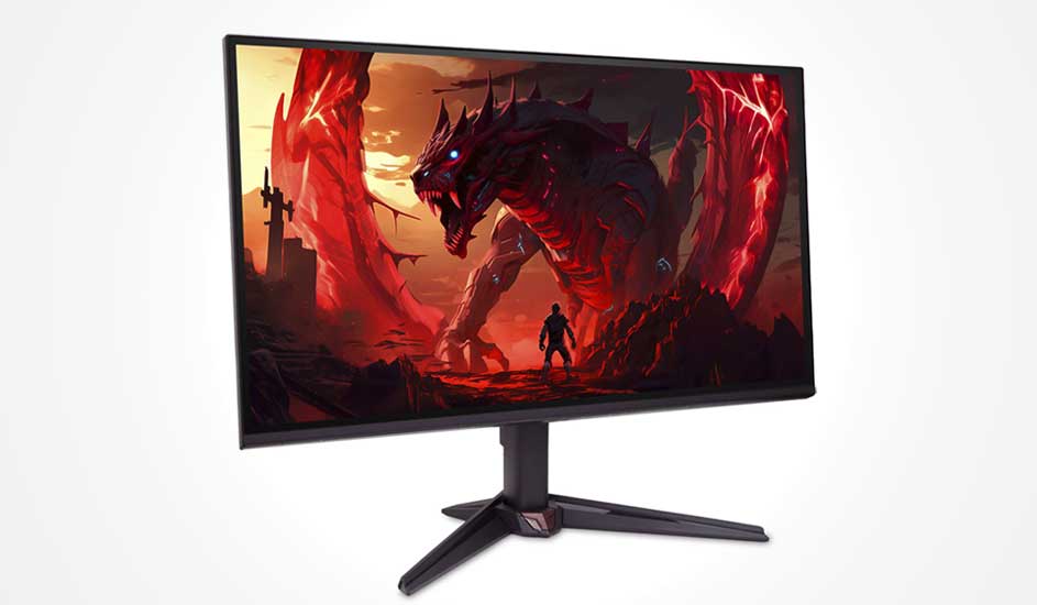 Gaming monitor showing a dark fantasy scene with a massive red dragon facing a lone warrior in a fiery, jagged valley landscape.