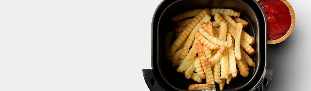 Wanneer verwarm je een airfryer voor en hoe werkt dat precies? 