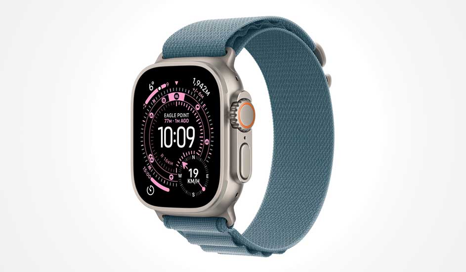 Silver smartwatch with a blue fabric strap, showing a black dial packed with pink fitness stats and the digital time 10:09.