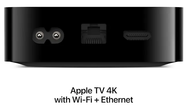 Achterkant van een zwarte Apple TV 4K met aansluitingen voor stroom, ethernet en HDMI.