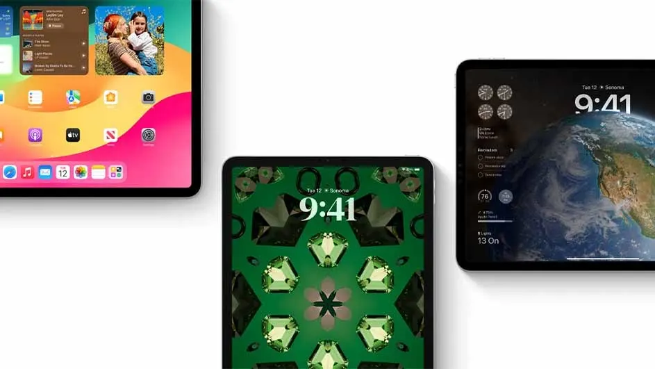 Three tablets display different screens. The first features a colorful home screen. The second shows a green gemstone pattern. The third displays an earth image.