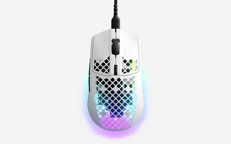 White perforated wired gaming mouse displays vivid RGB lighting through its grid shell, looking lightweight and striking on a white background.