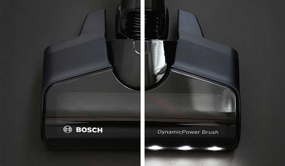 A Bosch DynamicPower Brush appears split: left side dark, right side lit by bright LEDs that reveal dust on gloomy floors.
