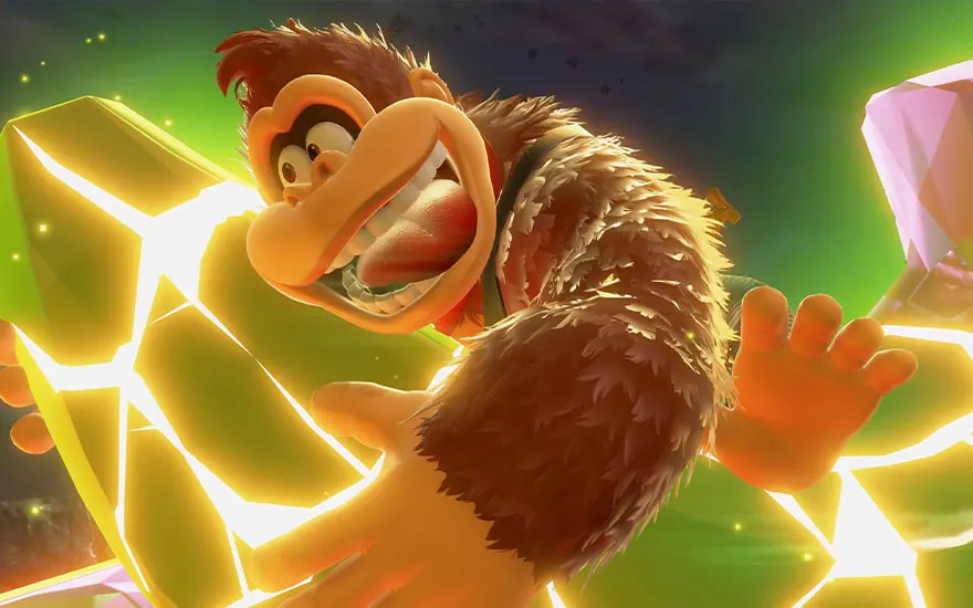 Donkey Kong straalt vol energie met uitgestrekte armen, omringd door gloeiende gele kristallen en een levendige groene achtergrond.