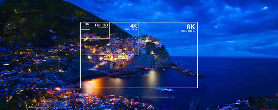 Image compares SD, Full HD, 4K, and 8K resolutions on a coastal cityscape at night, with lights reflecting on the water.