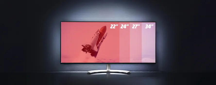 Een computerscherm op een zilveren voet toont een ruimteveer tegen een rode achtergrond, met de tekst "22" 24" 27" 34".
