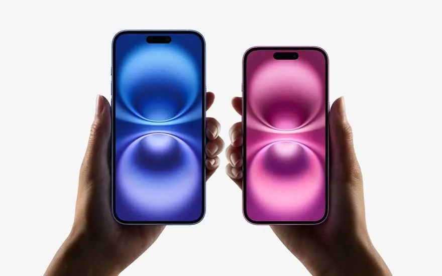 Two hands each hold a smartphone, one with a blue circular pattern display and the other pink, both facing forward.