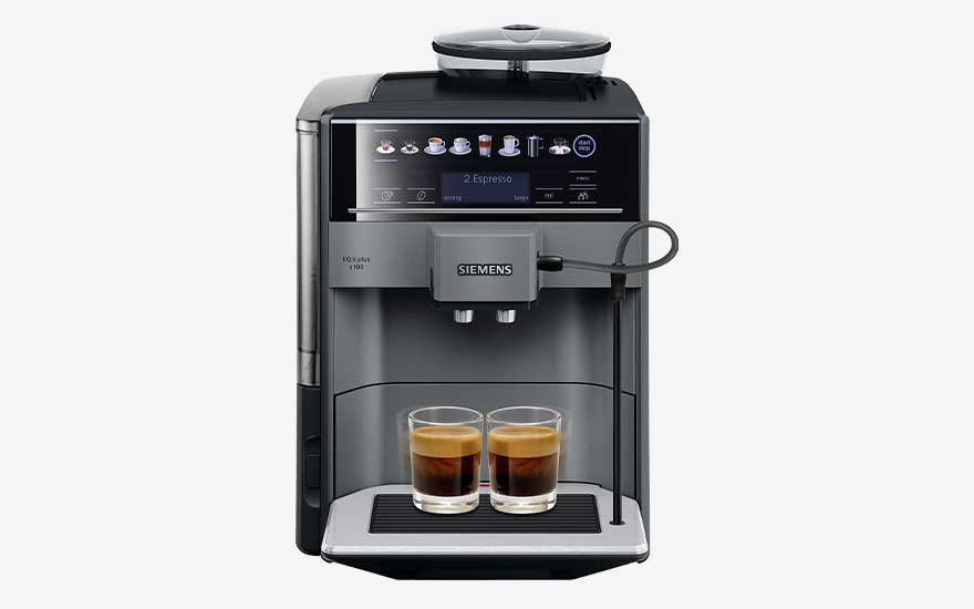 A Siemens coffee machine prepares two cups of espresso at once; it features a digital display and a sleek black design. Brand: Siemens.