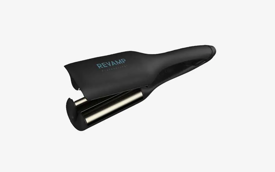 Black Revamp hair styler with wide rounded plates is placed at an angle on a light backdrop, crafted to shape soft waves and add volume to hair.
