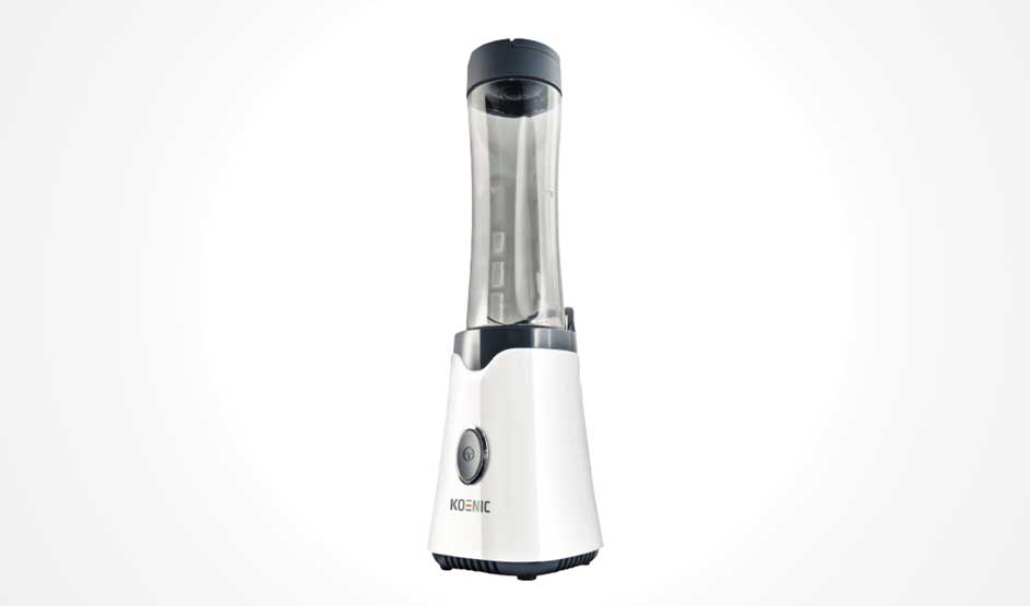 A compact white blender with a clear jug and black lid stands centred on a white background; a round button and brand name show on the front.