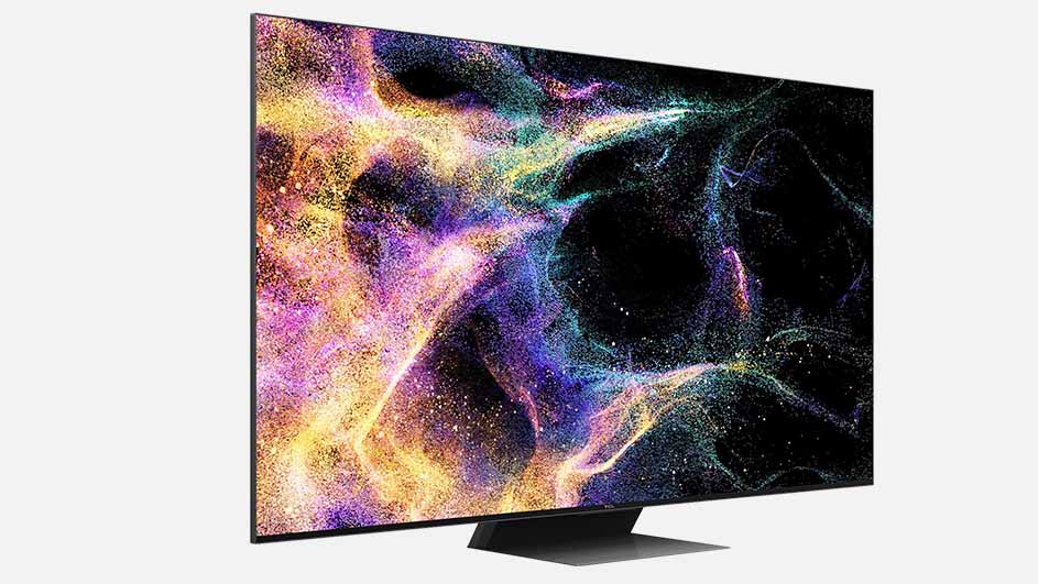 Een platte tv staat op een voetstuk met een kleurrijke grafische weergave tegen een witte achtergrond.