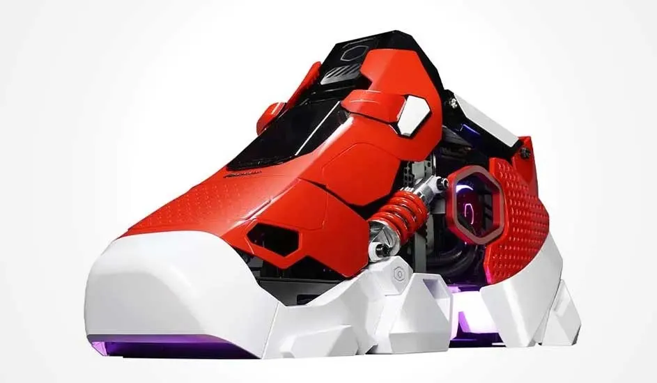 Futuristic red and white PC case shaped like a trainer, featuring exposed cooling, springs and subtle purple lighting.