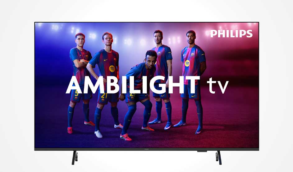 A Philips Ambilight television shows five footballers in kit against a purple-red background.