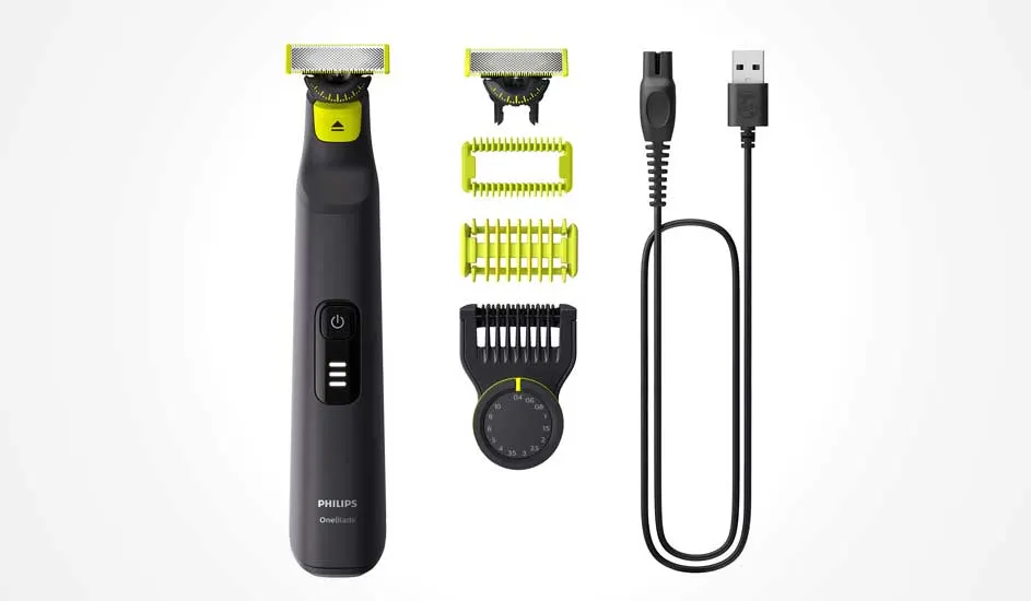 Een Philips OneBlade met twee gele opzetstukken, een zwarte verstelbare opzetkam en USB-oplaadkabel op een witte achtergrond.