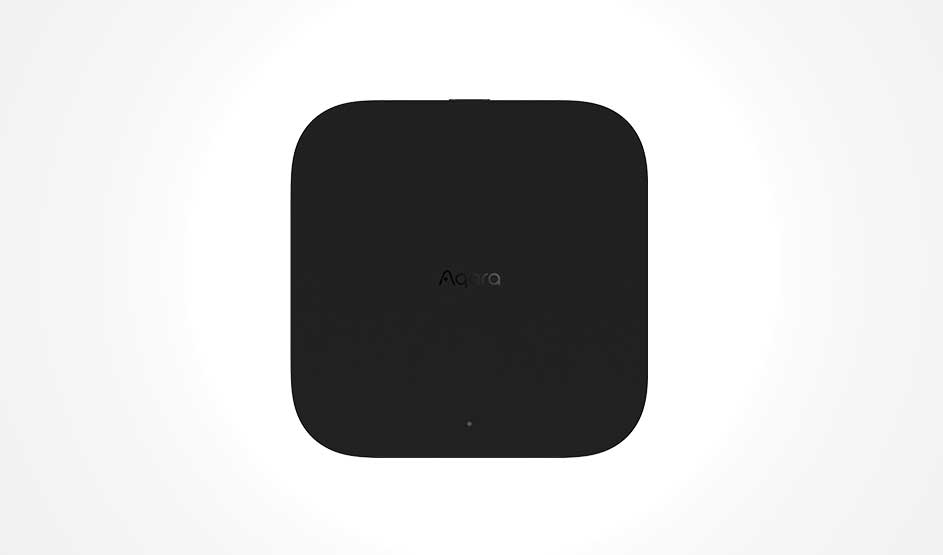 A compact black Aqara device with rounded corners is shown from the front against a plain, light background.