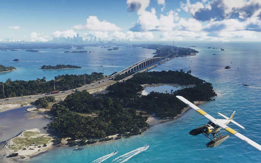 A seaplane soars above turquoise waters, passing islands and a long bridge with a distant city skyline ahead.