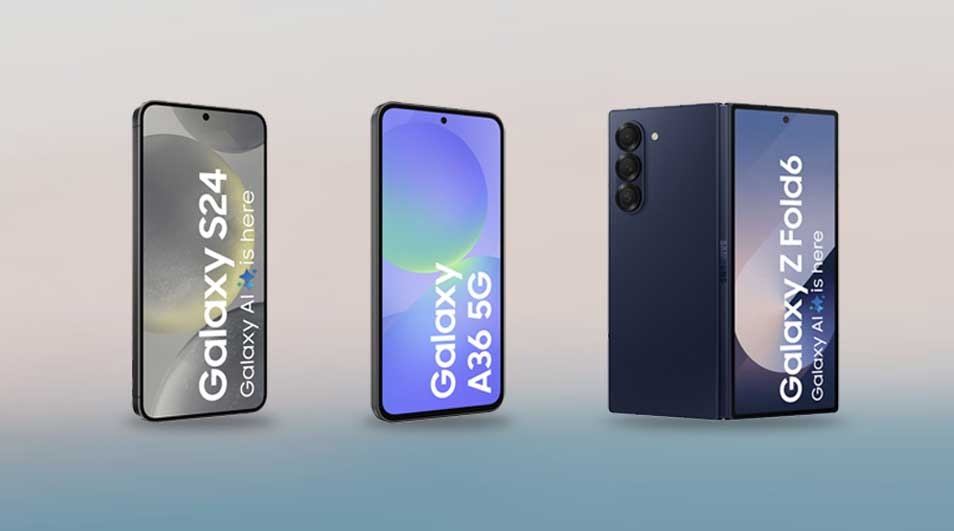 A light blue smartphone lies beside a black phone with colourful screen on a white marble surface, both featuring multiple camera modules.
