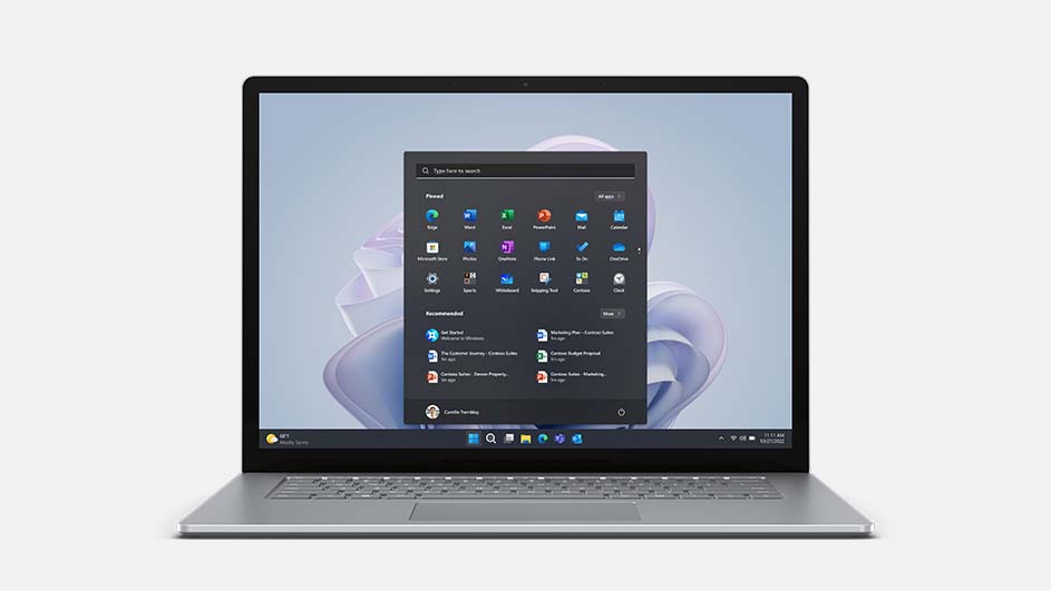 Een laptop met een Windows-startmenu overlay, tegen een effen witte achtergrond. Het scherm toont diverse app-icoontjes.