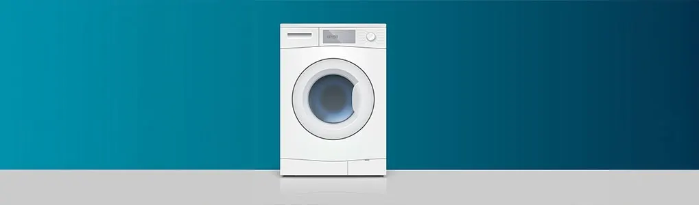 A white washing machine stands against a two-tone blue wall with a gray floor.