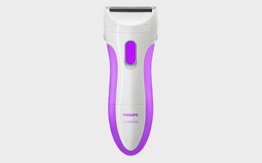 The Philips Ladyshave, white with purple accents, is clearly displayed, ideal for smooth shaving.