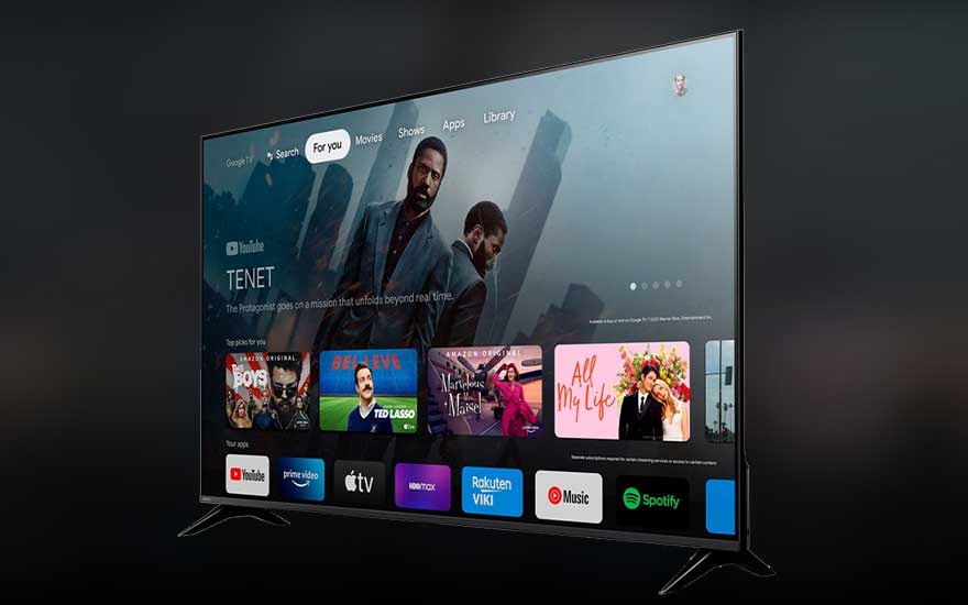 A modern smart TV displays a clear menu featuring apps like YouTube, Spotify, and Amazon Prime Video.