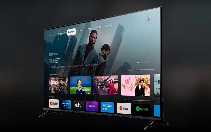 A modern smart TV displays a clear menu featuring apps like YouTube, Spotify, and Amazon Prime Video.