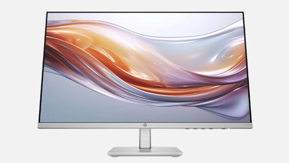 Een zilverkleurige computerscherm staat op een witte achtergrond, met een abstract patroon op het scherm.