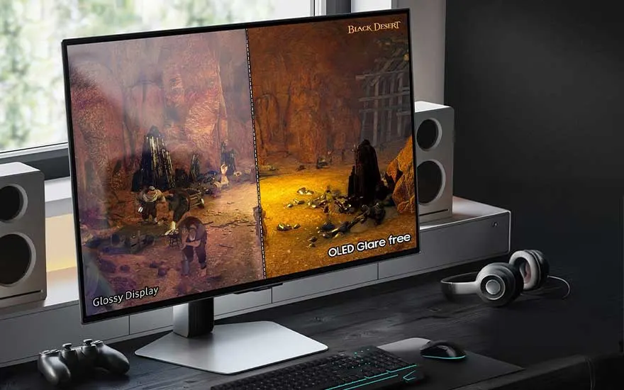 A gaming monitor displays a game scene comparing glossy and OLED glare free modes, set on a neat desk with speakers and headset.