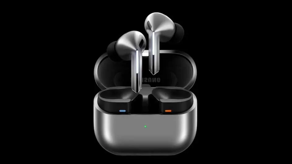 Zilverkleurige draadloze oordopjes in een open oplaaddoos met blauwe en oranje indicatielampjes, tegen een zwarte achtergrond.