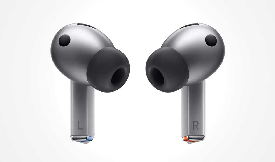 Two grey wireless earbuds with black silicone tips face each other on a pale background; L and R are printed on the stems.