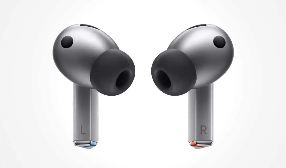Two grey wireless earbuds with black silicone tips face each other on a pale background; L and R are printed on the stems.