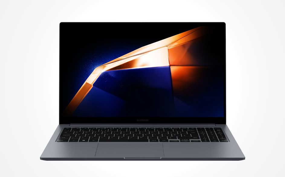 A slim silver laptop, open on white; large display with an abstract blue‑and‑orange angular shape, black keys and a wide trackpad.