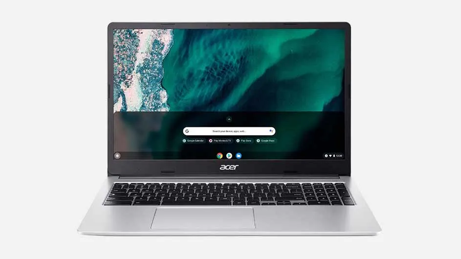 Een zilverkleurige Acer-laptop staat open, met een toetsenbord en touchpad zichtbaar. Het scherm toont een abstracte groene achtergrond.