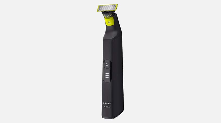 Een zwarte Philips OneBlade trimmer met een groene kop tegen een witte achtergrond.