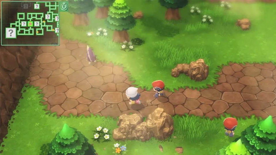 Zwei animierte Figuren auf braunem Steinweg in grüner Landschaft mit Bäumen, Felsen, Blumen und lila Kristall. Oben links: grüne Minikarte in einem Pokémon-Spiel.