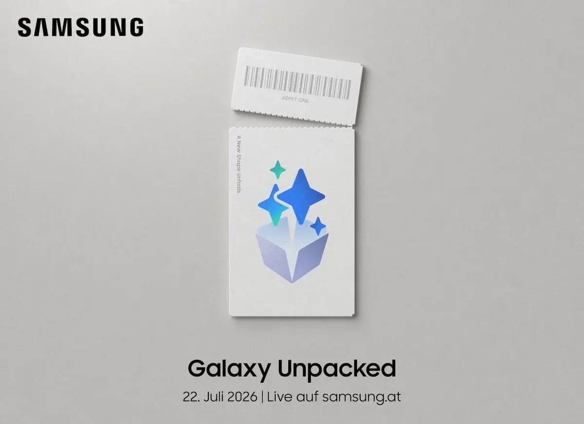 Samsung Galaxy Unpacked Einladung – Ein Veranstaltungsticket mit Strichcode-Abrissabschnitt (Aufschrift „Admit One") und dem Slogan „A New Shape Unfolds". Auf dem Ticket ist eine geöffnete Box mit bunten Sternfunken zu sehen. Darunter der Text: „Galaxy Unpacked – 22. Juli 2026 | Live auf samsung.at