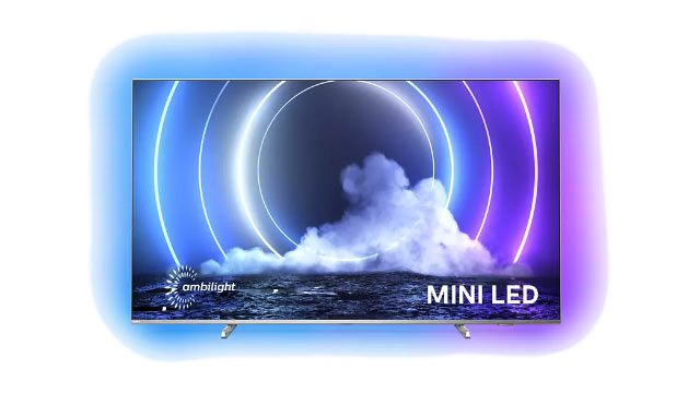 Ein LED-Fernseher zeigt ein Bild von Wolken und konzentrischen Kreisen auf blauem und lila Hintergrund.